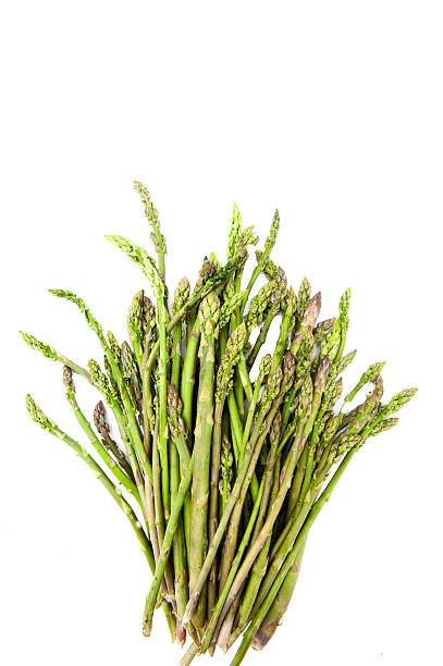 istock Bunch of asparagus heads vertical frame and isolated 473194632