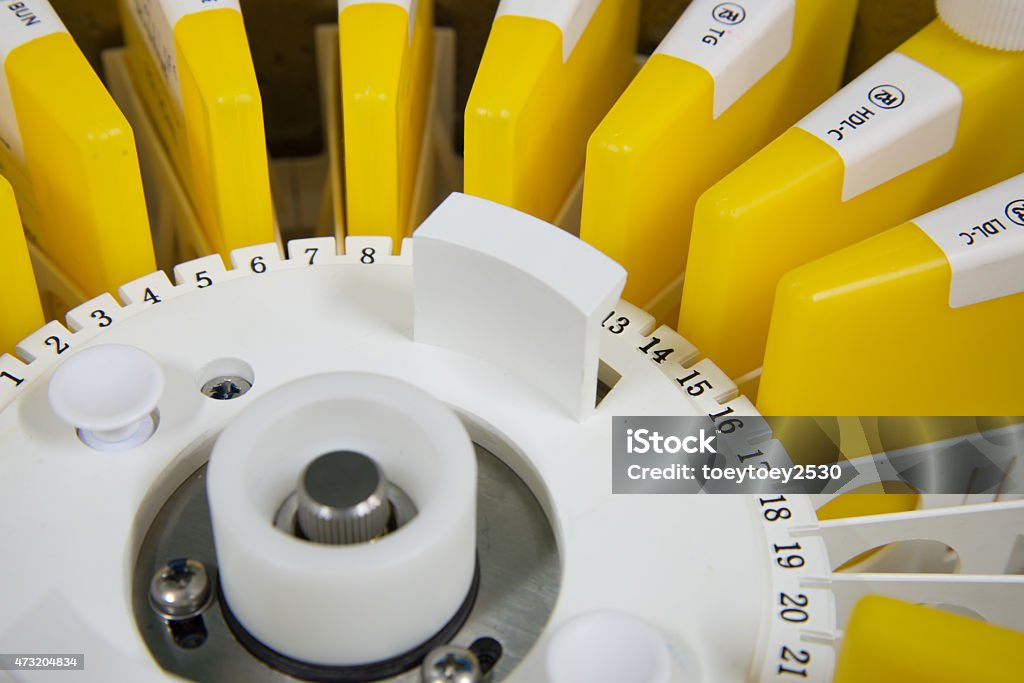 An automated analyzer is a medical laboratory instrument designe An automated analyzer is a medical laboratory instrument designed to measure different chemicals and other characteristics in a number of biological samples quickly, with minimal human assistance. 2015 Stock Photo