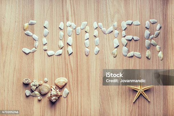 Sea Shells And Starfish On Wooden Table Stock Photo - Download Image Now - 2015, Abstract, Animal Shell