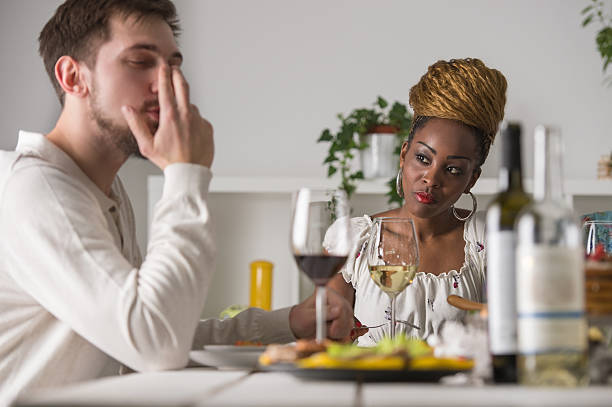 istock Multiracial Couple Enjoying Meal 473206590