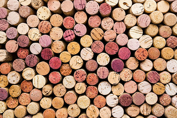 wine corks background colorful wine corks photographed from above cork material stock pictures, royalty-free photos & images