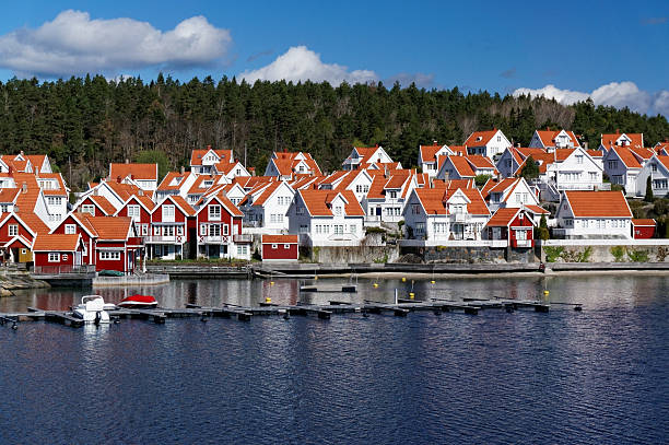 istock White Cottages summer the fjord. 473216460
