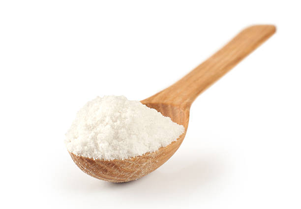 istock Wooden spoon with salt. 473217706