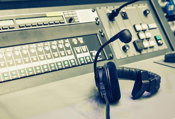 istock Headphone with Music mixer control desk in studio 473218176