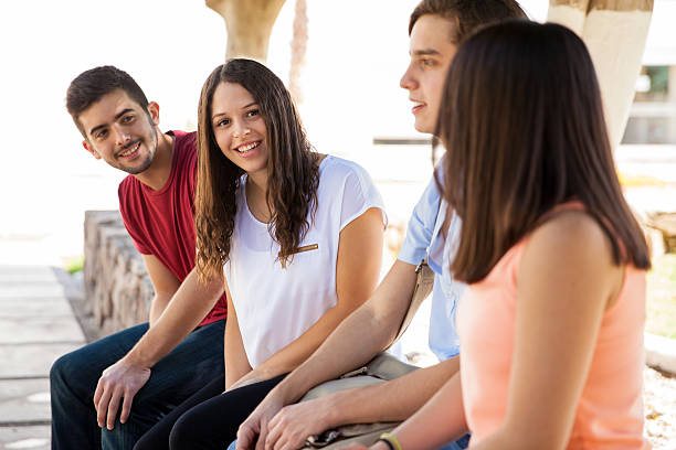 istock Cute girl with her friends 473224102