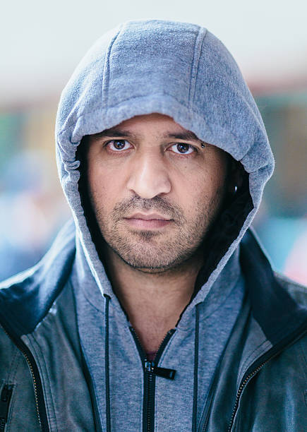 istock Mysterious man wearing hoodie 473226502