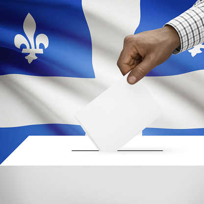 Ballot box with Canadian province flag on background - Quebec