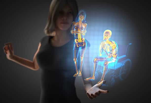 женщина и человек на инвалидной коляске с голограммой - hologram led futuristic women стоковые фото и изображения