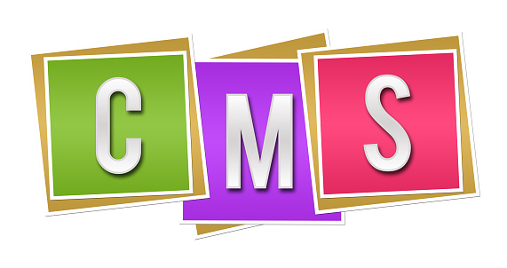 CMS concept image with word written over colorful blocks.