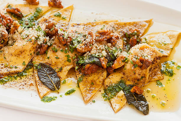 istock butternut squash ravioli with roasted walnuts and brown butter 473252636