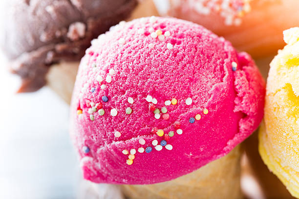 istock Ice cream scoops on wooden table. 473252900