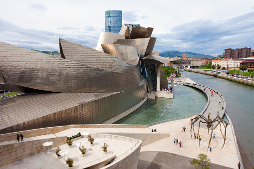 BILBAO, SPAIN - 03 18  2019: Guggenheim Museum Bilbao by Canadian-American architect Frank Gehry.