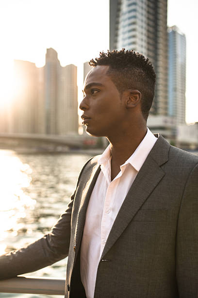 istock Elegant man on Dubai marina promenade 473260304