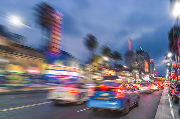 Los Angeles - Hollywood Boulevard and Walk of Fame Los Angeles - Hollywood Boulevard before sunset - Walk of Fame on a defocused vintage filtered look sunset strip stock pictures, royalty-free photos & images