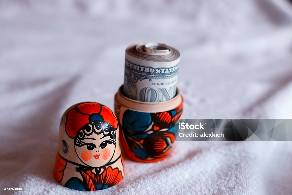 Matryoshka dolls colorful piggy bundle of money 2015 Stock Photo