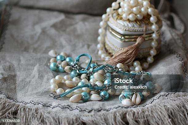 Jewelry Beads Jewelry On Linen Background Stock Photo - Download Image Now - 2015, Abstract, Art