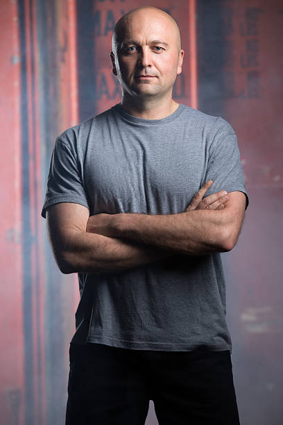 istock Portrait of a charismatic bald athlete 473264800