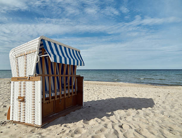 istock Roofed wicker beach chair 473265802
