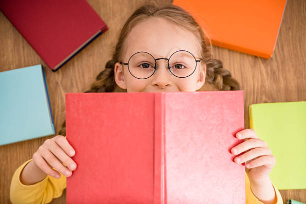 istock Girl with books 473268856
