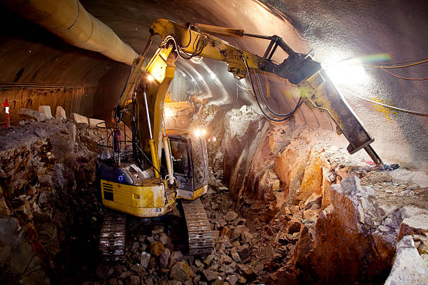 Hydraulic Hammer Excavator - Tunnel Construction stock photo