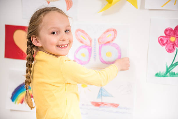 istock Little girl at home 473270012