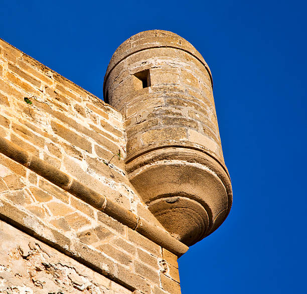 brick in old construction  africa morocco and   the tower near sky