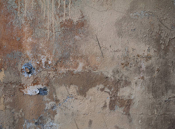 istock Texture of old wall covered with gray stucco 473271580