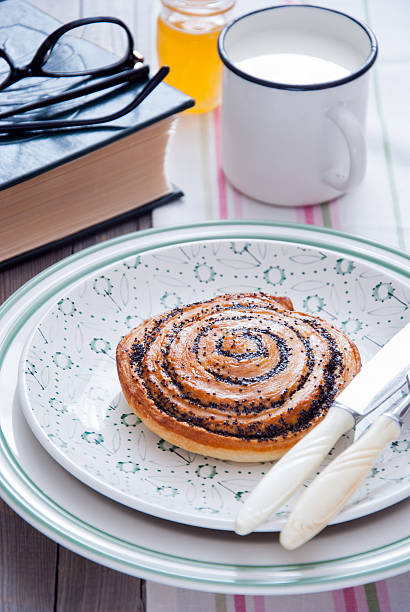istock Sweet poppy seed bun 473272164