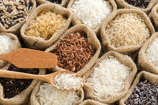 istock Group of organics rice in burlap bag 473284102