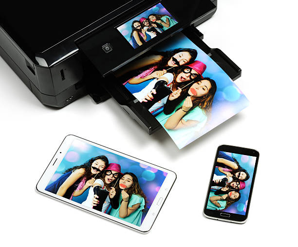 fotografia - computer printer printing out printout multi colored - fotografias e filmes do acervo
