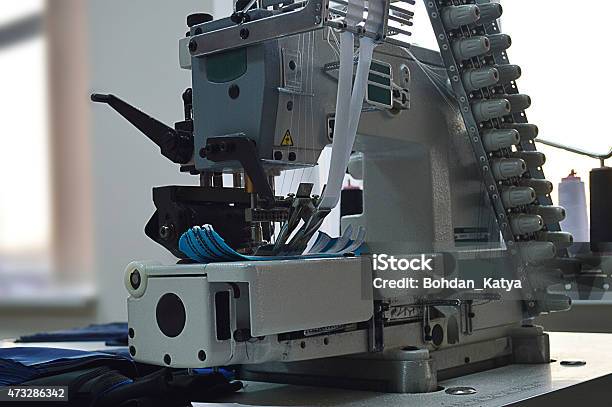 Garment Industry Sewing Machine Stock Photo - Download Image Now - 2015, Abundance, Acupuncture Needle