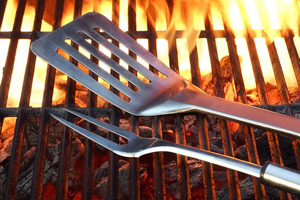 BBQ Tools On The Hot Grill stock photo
