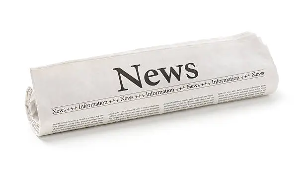 Photo of Rolled newspaper with the headline News