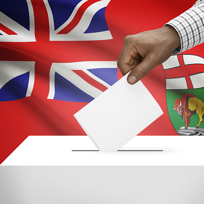 Ballot box with Canadian province flag on background - Manitoba