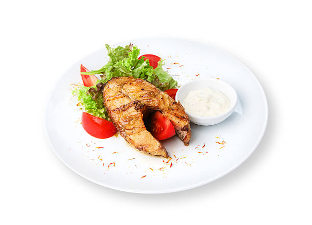 istock Restaurant food isolated - pikeperch fish steak 473294396