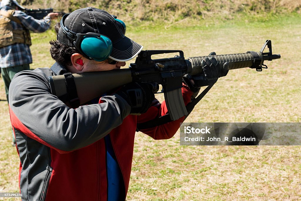 The Marksman The marksman shooting target practice.  Good guy with a gun. AR-15 Stock Photo