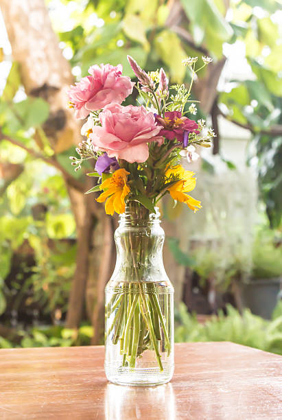 istock Glass vase with beautiful flowers 473296394