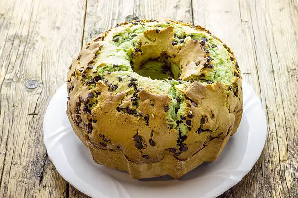 Photo of Donut with mint and drops of chocolate