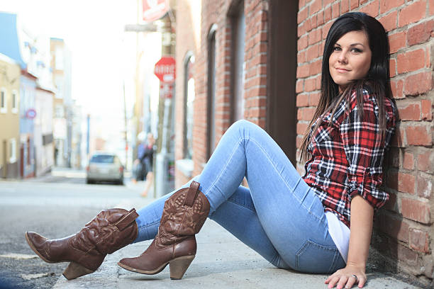istock woman sit street 473298352