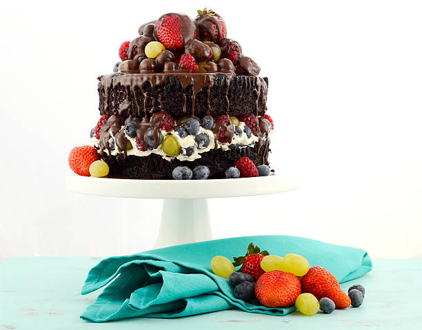 istock Deliciously divine chocolate cake with berries and cream. 473299844