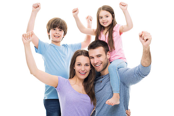 istock Excited family with arms raised 473300290