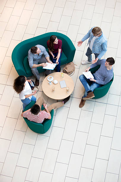 istock College Students and a Teacher Meet in a Cafe 473301974