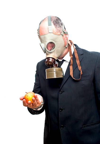 istock Businessman with gas mask 473302902