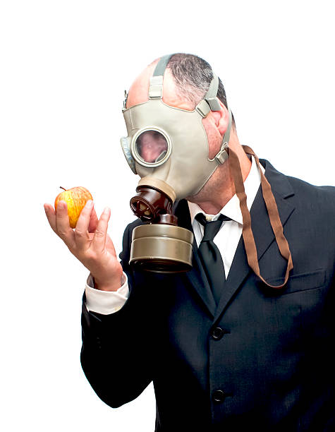 istock Businessman with gas mask 473302906