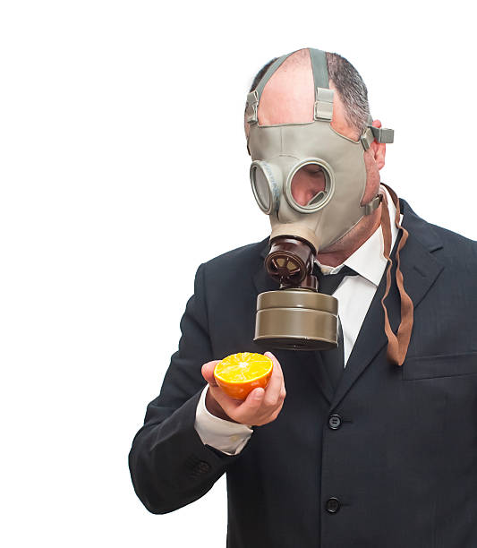 istock Businessman with gas mask 473302954