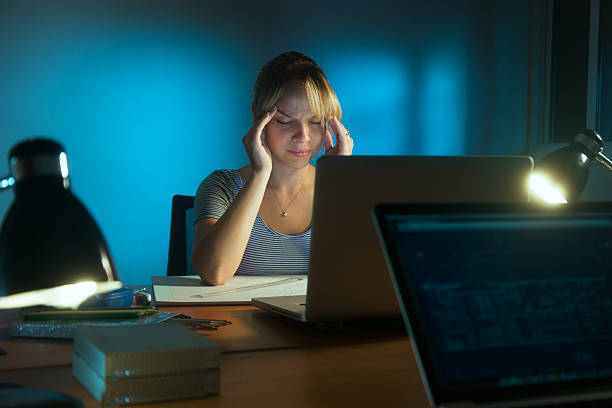istock Woman With Eyes Tired Working Late At Night In Office 473303330