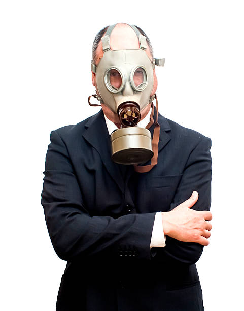 istock Businessman with gas mask 473303944