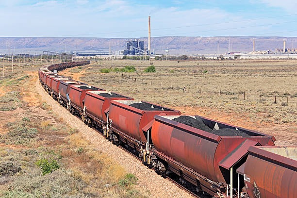 istock Heavy coal train arriving at power station 473309024