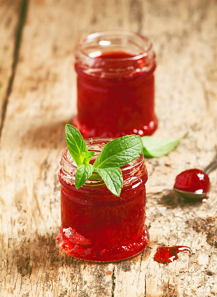istock Delicious homemade strawberry jam in a jar, selective focus 473311610