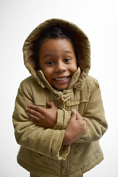 bambino con cappuccio - garment snow little boys child foto e immagini stock